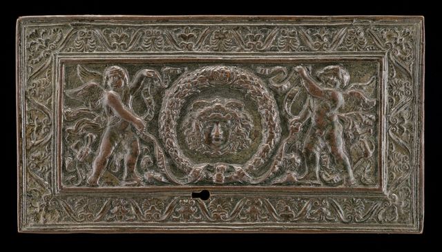 Cover of a writing casket: Geniuses with Wreath and Medusa Head