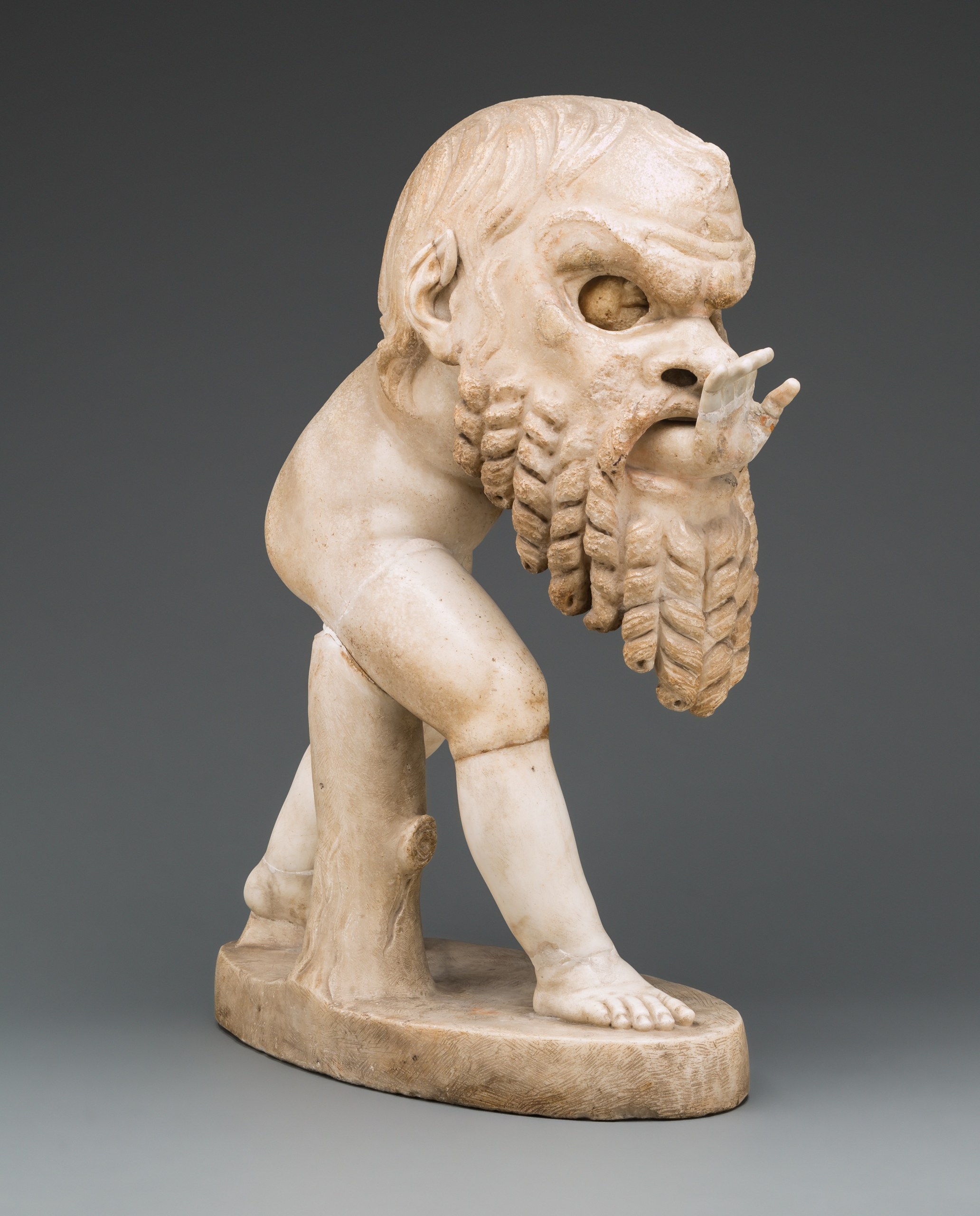 Statue of a Young Satyr Wearing a Theater Mask of Silenos
