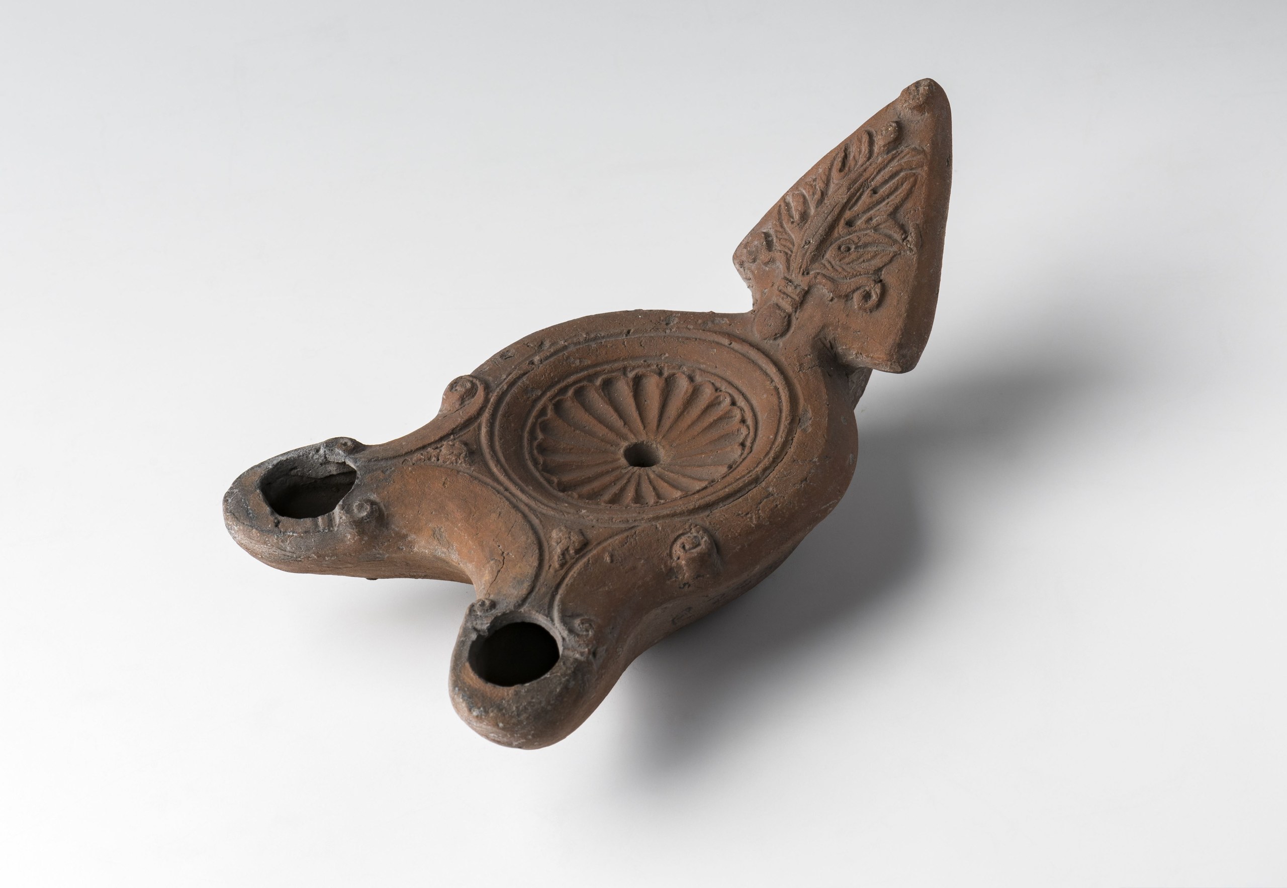 Two-spouted lamp with palmette handle