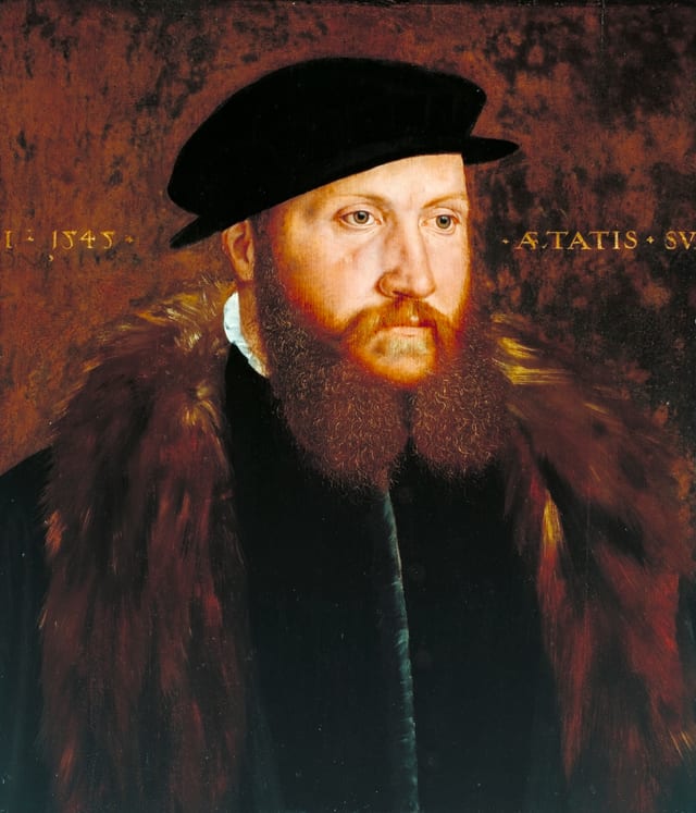 A Man in a Black Cap