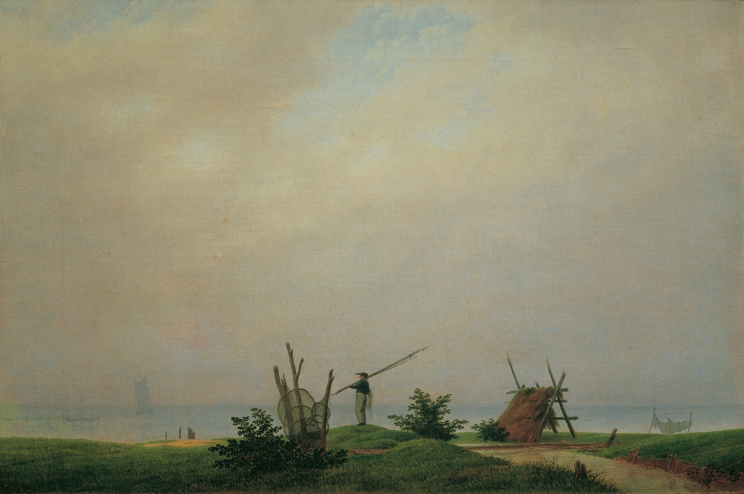 Seashore with fisherman